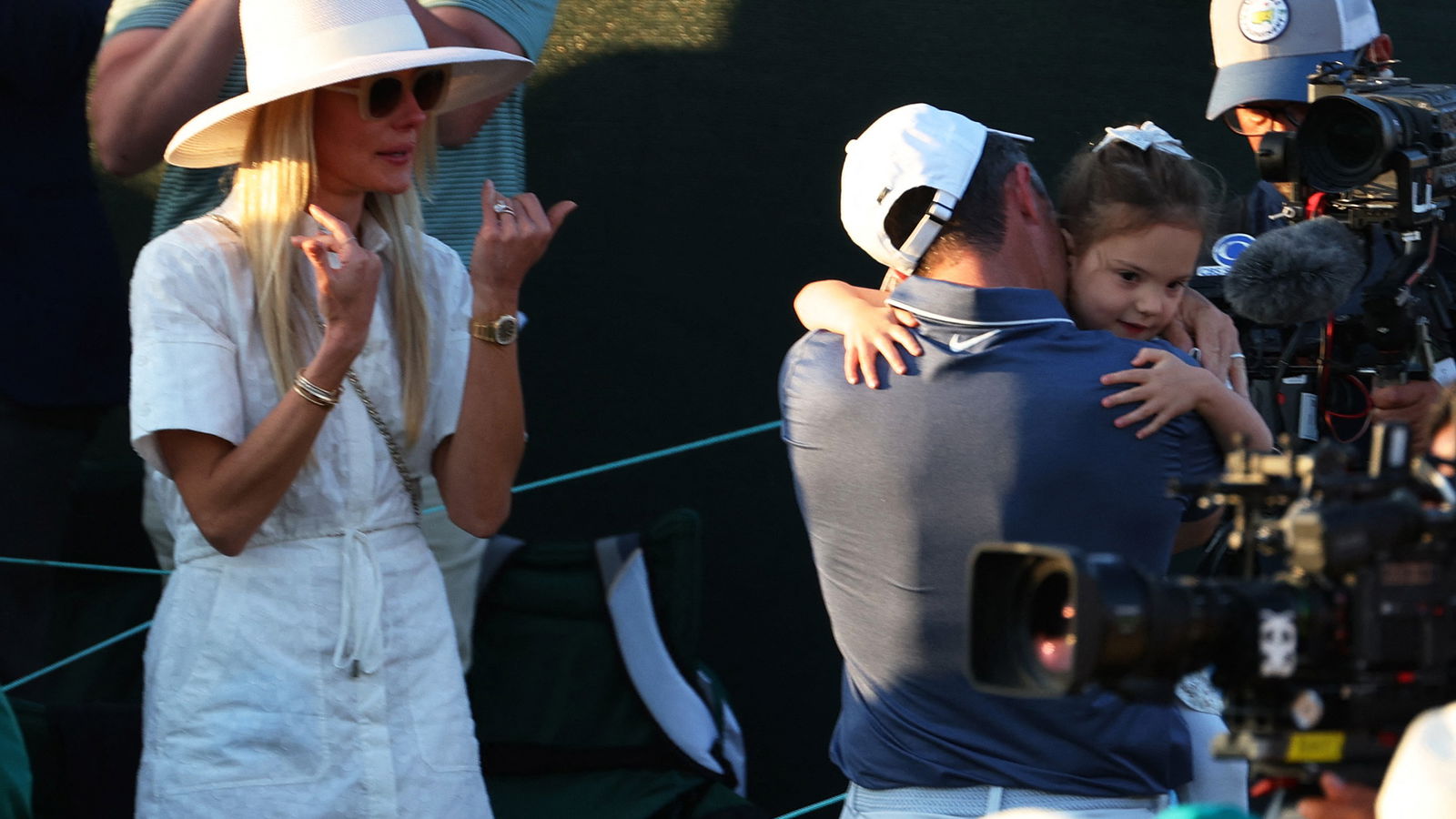 Rory hugs Poppy as Erica watches on